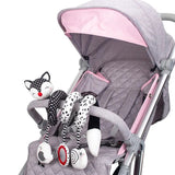 Gray stroller with pink accents and a fox-shaped toy attached to the handle.