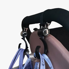 2PCS Baby Hanger Stroller Hooks with black clip-on straps for hanging diaper bags and shopping totes on pram handles during walks.