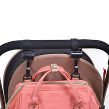 Baby Stroller Hook clip set holding a pink diaper bag on a stroller frame for easy nappy changes and outings.