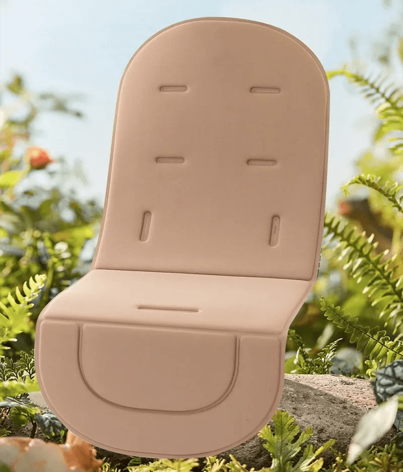 Soft Seat Cushion for Baby Stroller and High Chair beige liner shown outdoors for park strolls, garden trips, and everyday pram comfort.