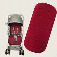 Soft Seat Cushion for Baby Stroller and High Chair fitted in a grey pram with a red footmuff for cosy winter walks and outdoor naps.