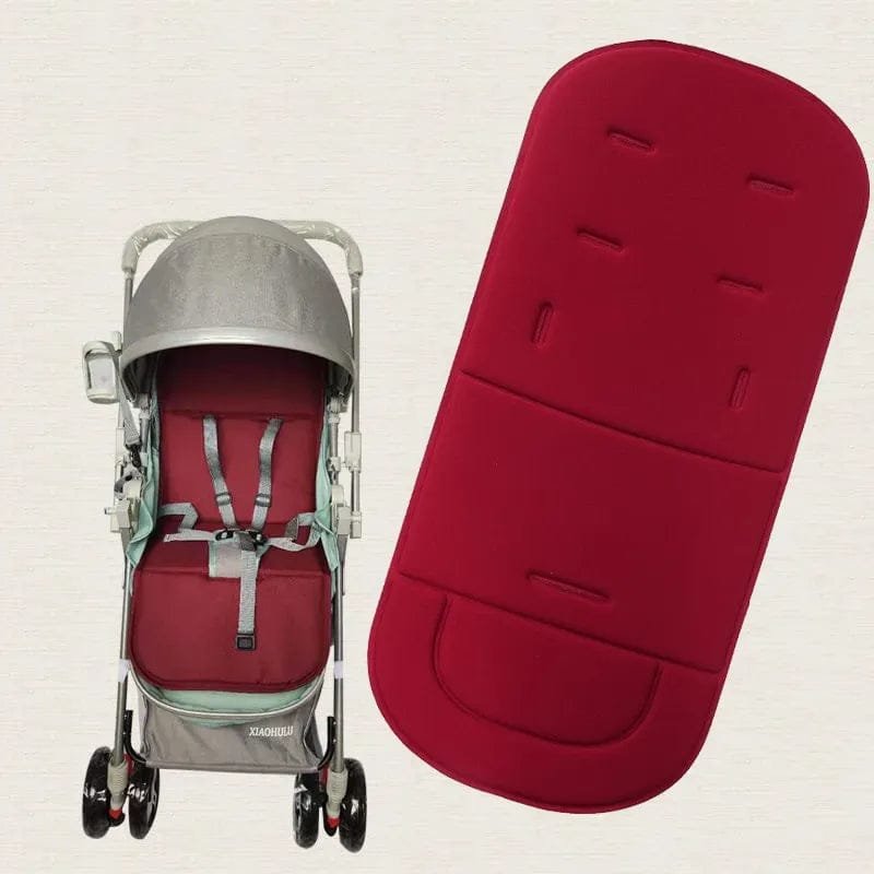 Soft Seat Cushion for Baby Stroller and High Chair fitted in a grey pram with a red footmuff for cosy winter walks and outdoor naps.