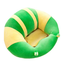 Green and yellow striped baby support seat for keeping infants upright during story time and playtime.