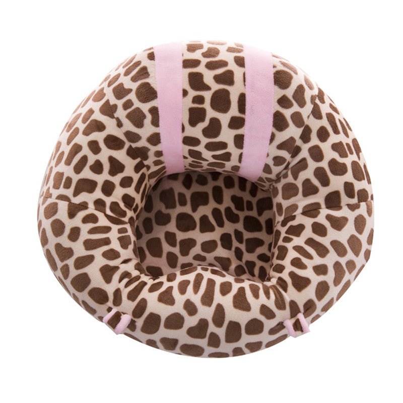 Leopard print baby support sofa seat with pink accents for stylish, cushioned infant sitting at home.