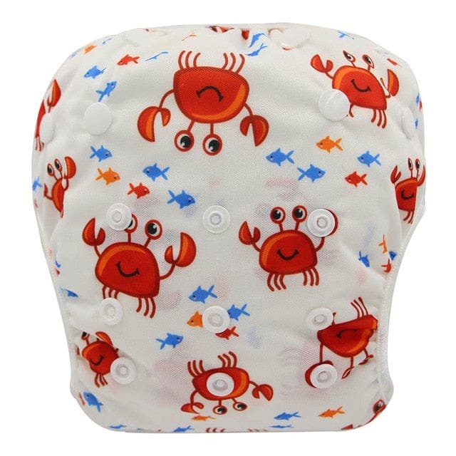 Crab and fish print baby swim diaper, a summer waterproof swim nappy for beach breaks and garden water play.