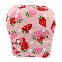 Pink strawberry print baby swim diaper pant with adjustable snaps for comfortable swimming and paddling pool sessions.