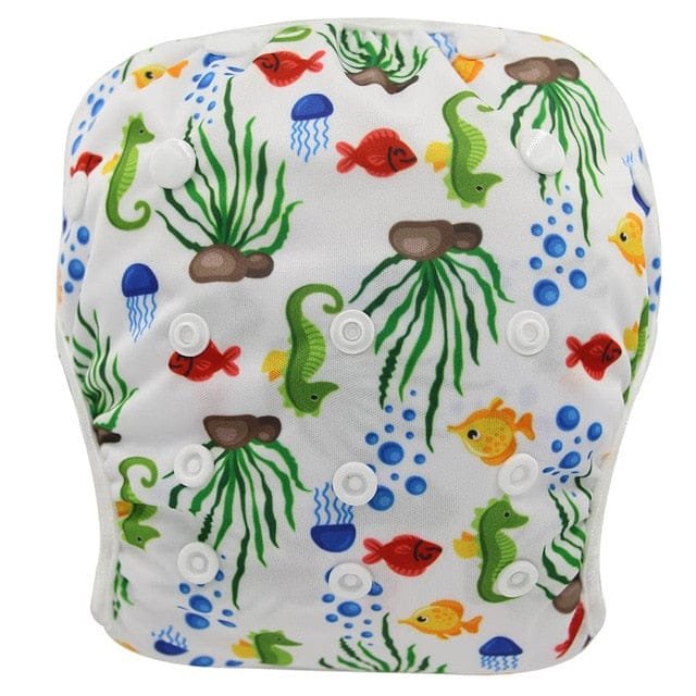 Seahorse and jellyfish print baby swim diaper, a waterproof swim nappy for infant swim sessions and holiday pool days.