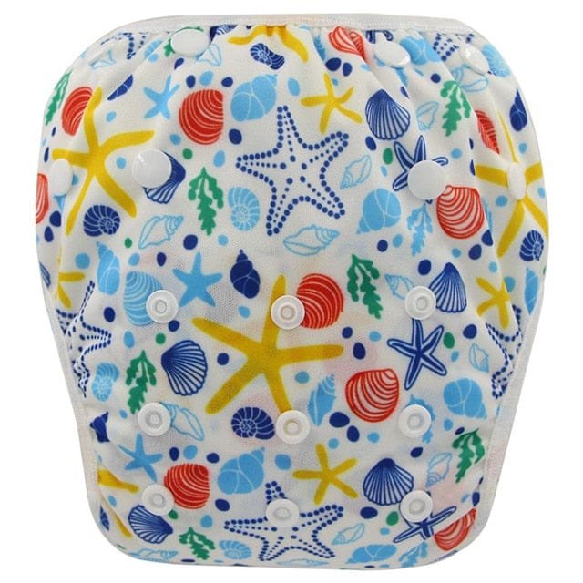 Starfish and shell print baby swim diaper, a beach-ready swim nappy for sandy days and shallow-water paddling.