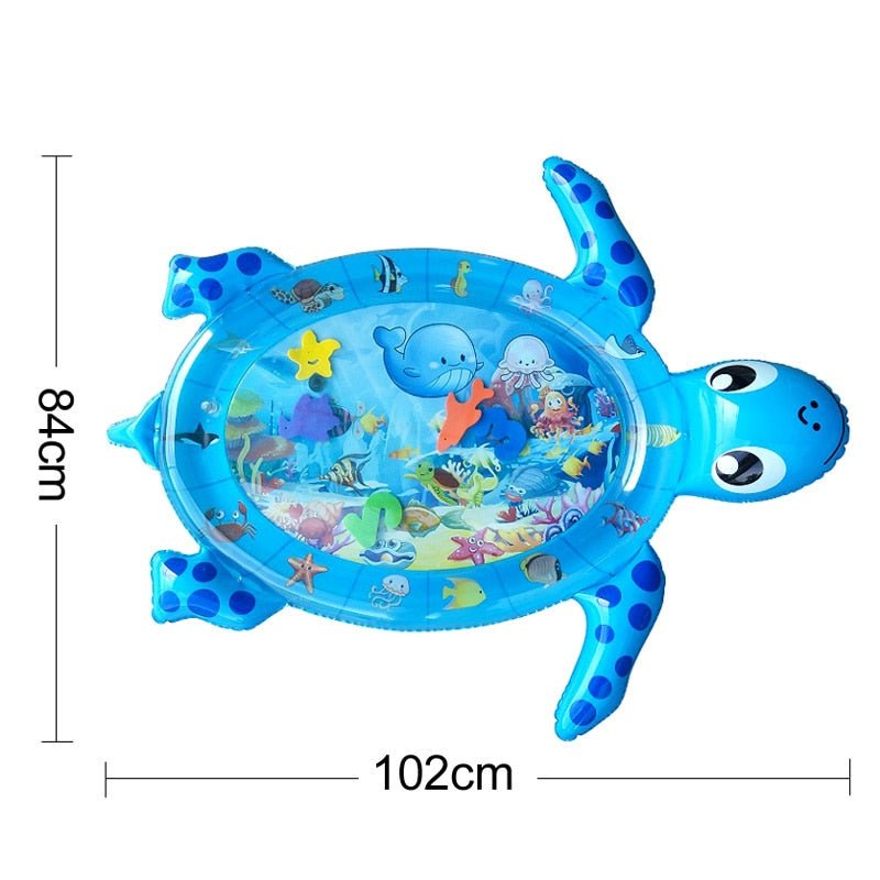 Blue turtle-shaped inflatable play mat with ocean-themed graphics and measurements.