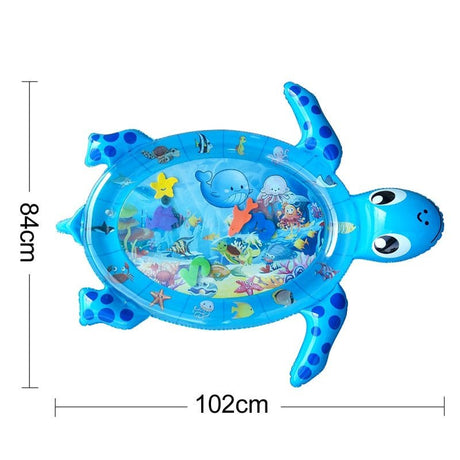 Blue turtle-shaped inflatable play mat with ocean-themed graphics and measurements.