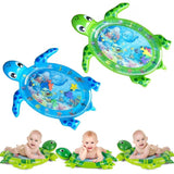 Two inflatable turtle-shaped water play mats with baby illustrations.