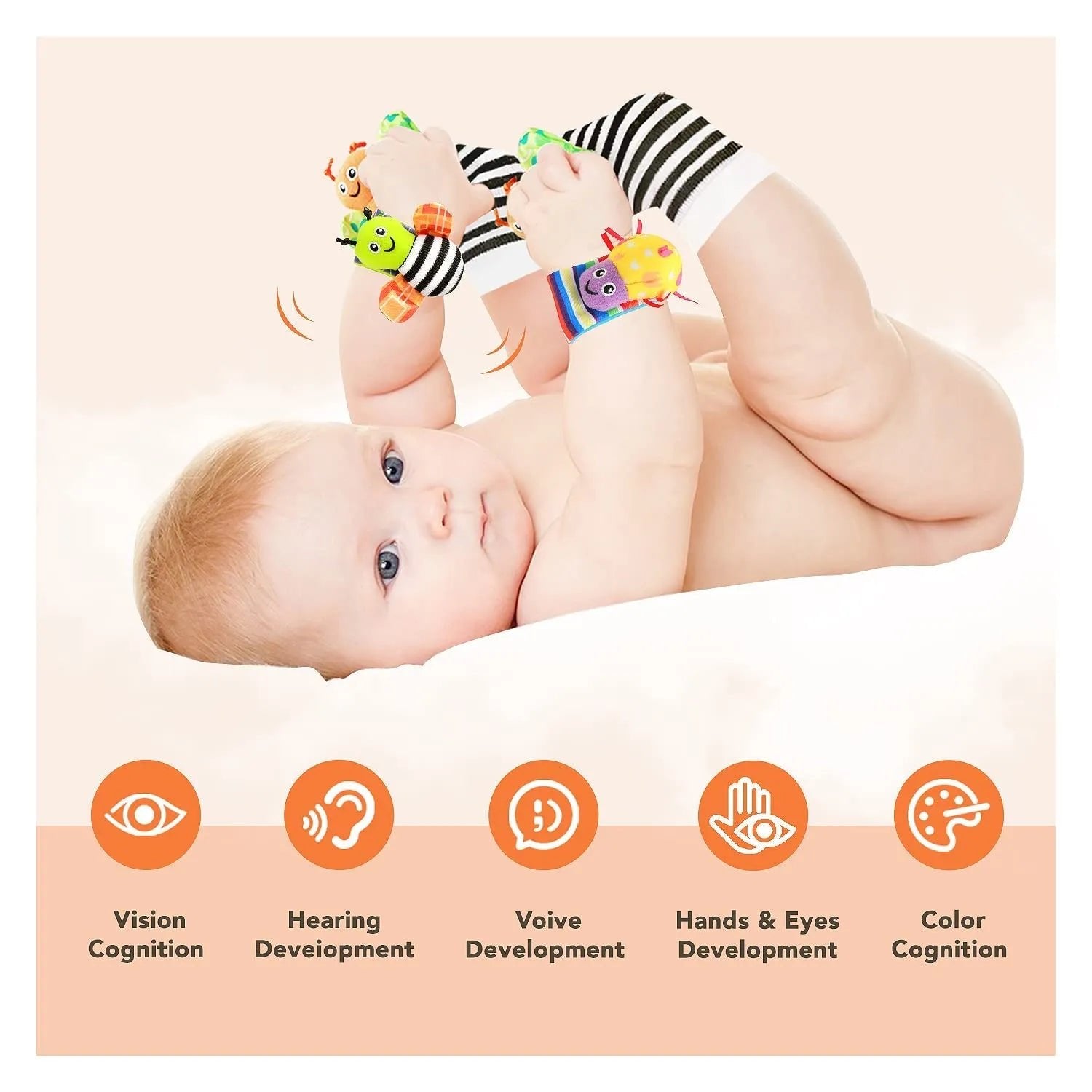 Baby wearing the foot finder socks and wrist rattles from the 4-piece set during tummy time and floor play.
