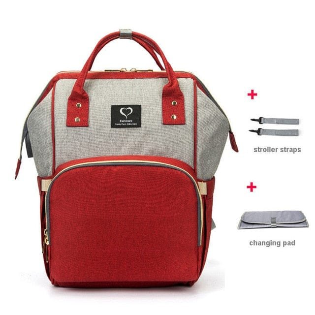 Red and gray backpack with stroller straps and changing pad on a white background