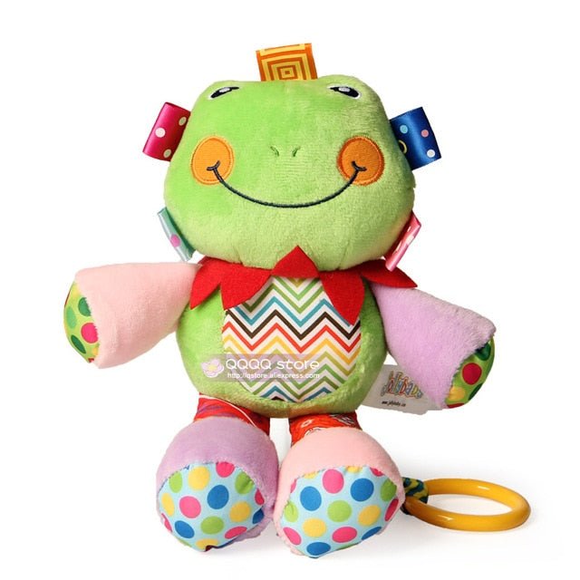 Colorful plush toy frog with polka dot patterns on a white background
