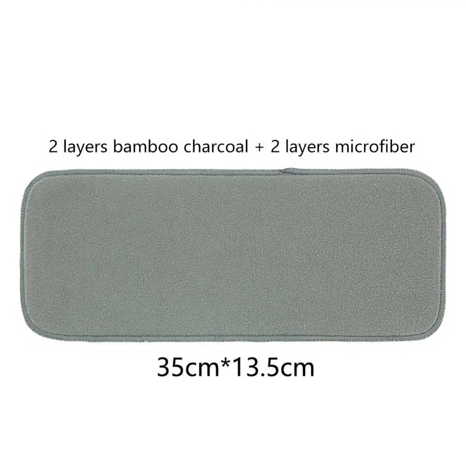 Bamboo charcoal diaper booster liner with material composition details for absorbency.