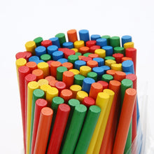 Bamboo counting sticks in a clear storage container for tidy classroom use and home maths practice.