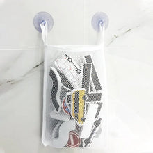 Mesh storage bag with suction cups for hanging rail and traffic bath toys to drain and dry after bathing.
