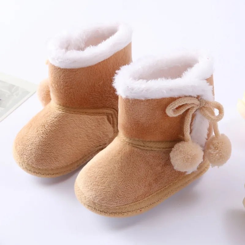 Baywell grey autumn winter newborn boots with soft sole and fur lining, shown from the side for cozy baby wear from 0 to 18 months.