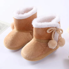 Baywell pink autumn winter newborn boots with soft sole and fur lining, shown from the front for cozy baby wear from 0 to 18 months.