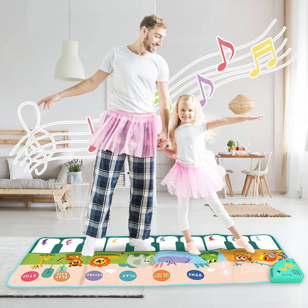 Man and child playing on a colorful musical mat in a living room.