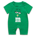 Green baby romper with M&M character design on a white background