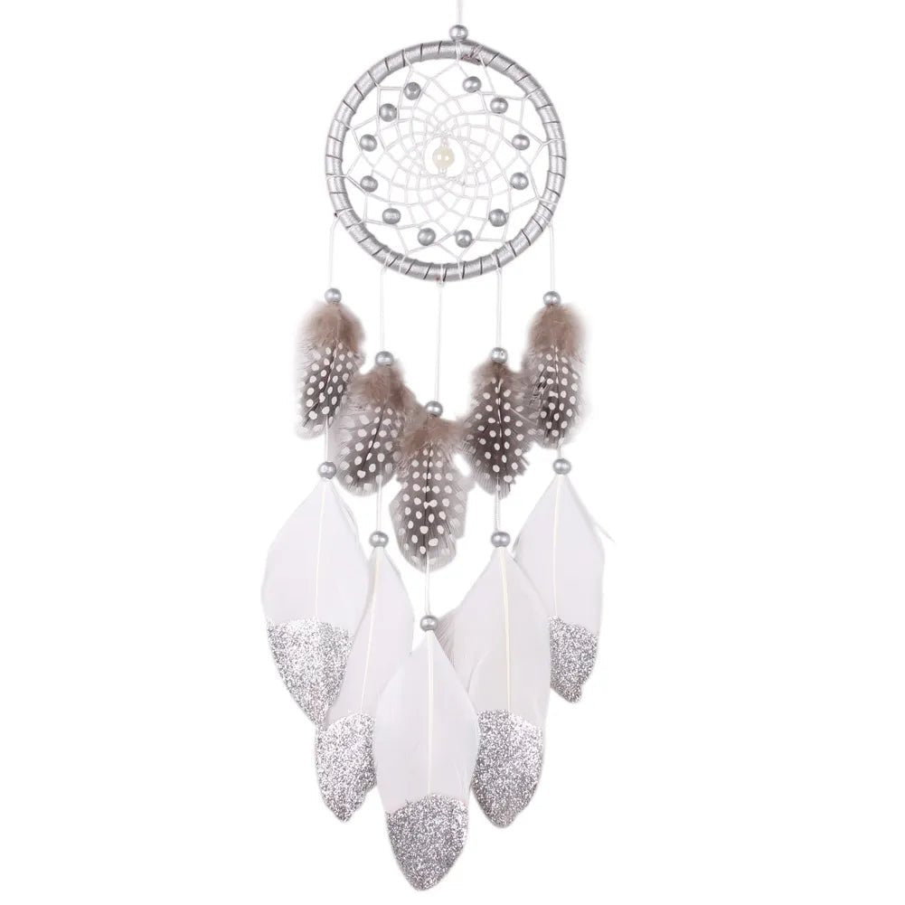 Beaded feather dream catcher crafted as a rattan handicraft for home decor.