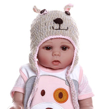 48CM Bebe Doll wearing a bear-themed outfit and hat, a bath-friendly silicone doll for newborn gifting and play.