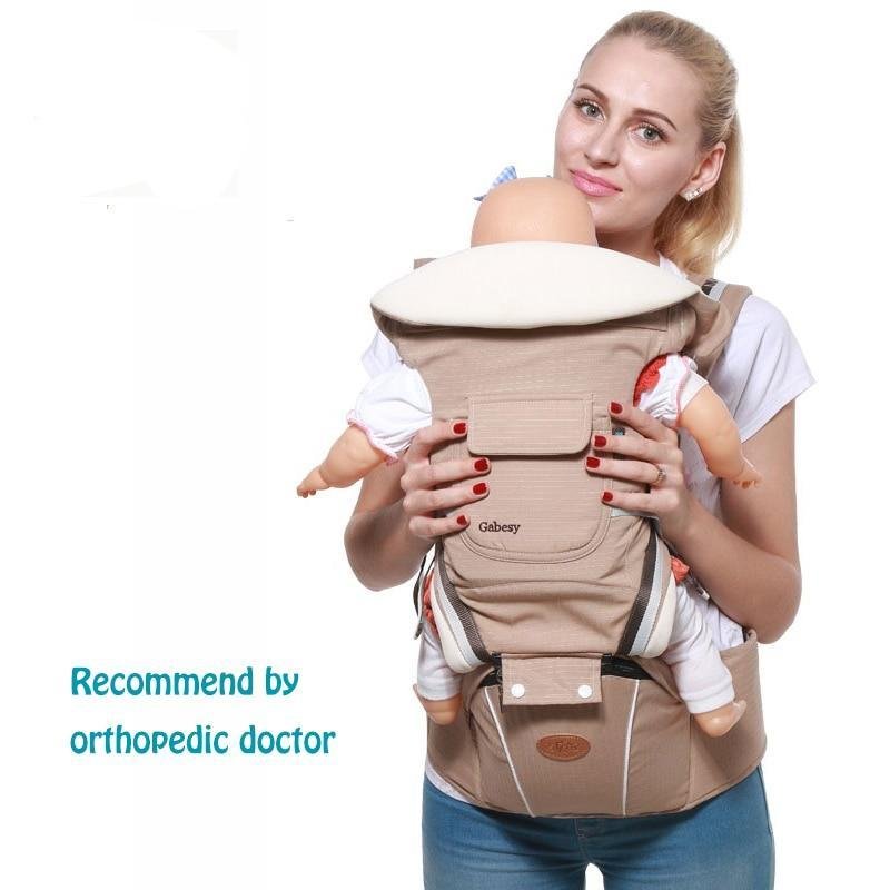 Beige Bebear baby hipseat carrier for front and back carrying positions that support healthy hip posture.