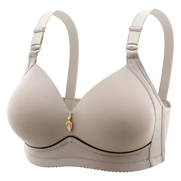 Beige wirefree breathable glossy bra with a decorative clasp, designed for full-figure everyday comfort.
