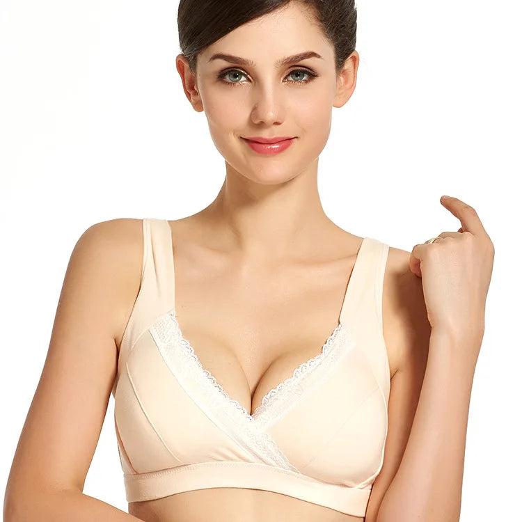 Beige wireless cotton nursing bra in cross-front vest style for comfortable all-day nursing wear.