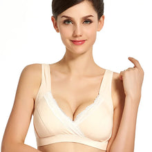 Beige wireless cotton nursing bra in cross-front vest style for comfortable all-day nursing wear.