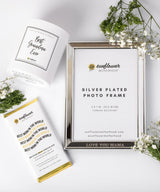 Silver-plated photo frame with packaging and decorative elements 