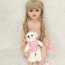 Betty Princess Reborn Girl full silicone doll body detail with a teddy bear, showing the poseable form for dressing and bathing.