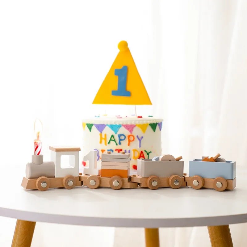 Montessori wooden train and trolley learning toy paired with a train-themed birthday candle holder.
