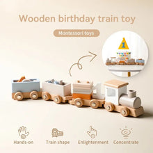 Wooden Montessori train and trolley toy shown with a birthday cake and number one topper for first birthdays.