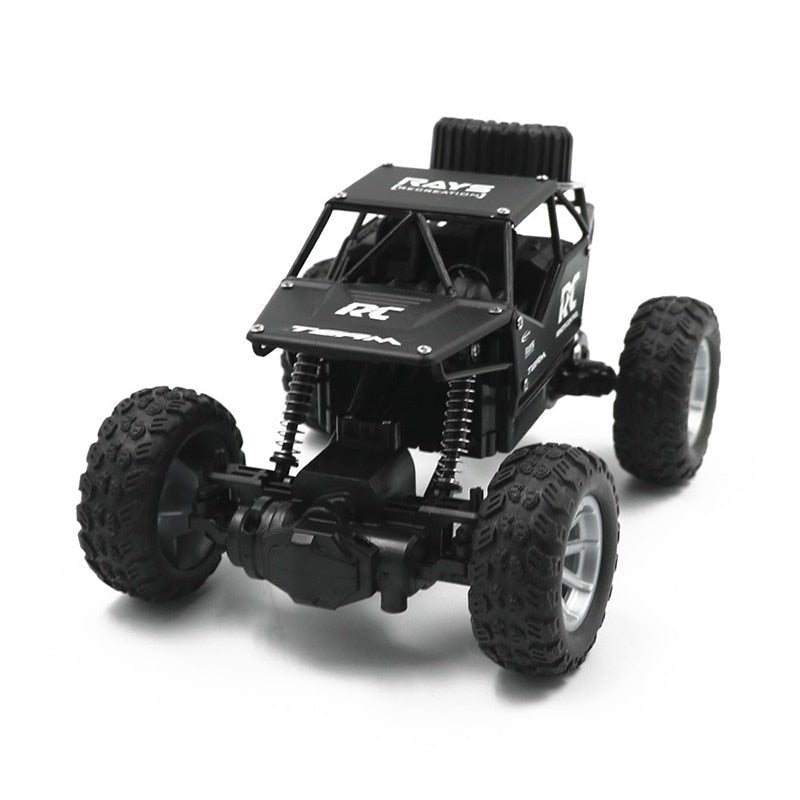 Black 4WD RC off-road truck side view designed for high-speed radio control driving.
