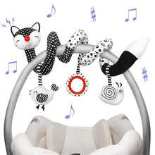 Baby crib mobile with cat-themed hanging toys.