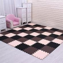 Black, beige, and coffee EVA foam puzzle mat set up indoors for everyday baby play.
