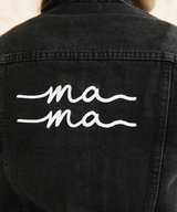 Black denim jacket with 'ma ma' embroidery on the back