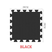 Black EVA foam interlocking puzzle mat shown indoors for safe cushioned baby play.
