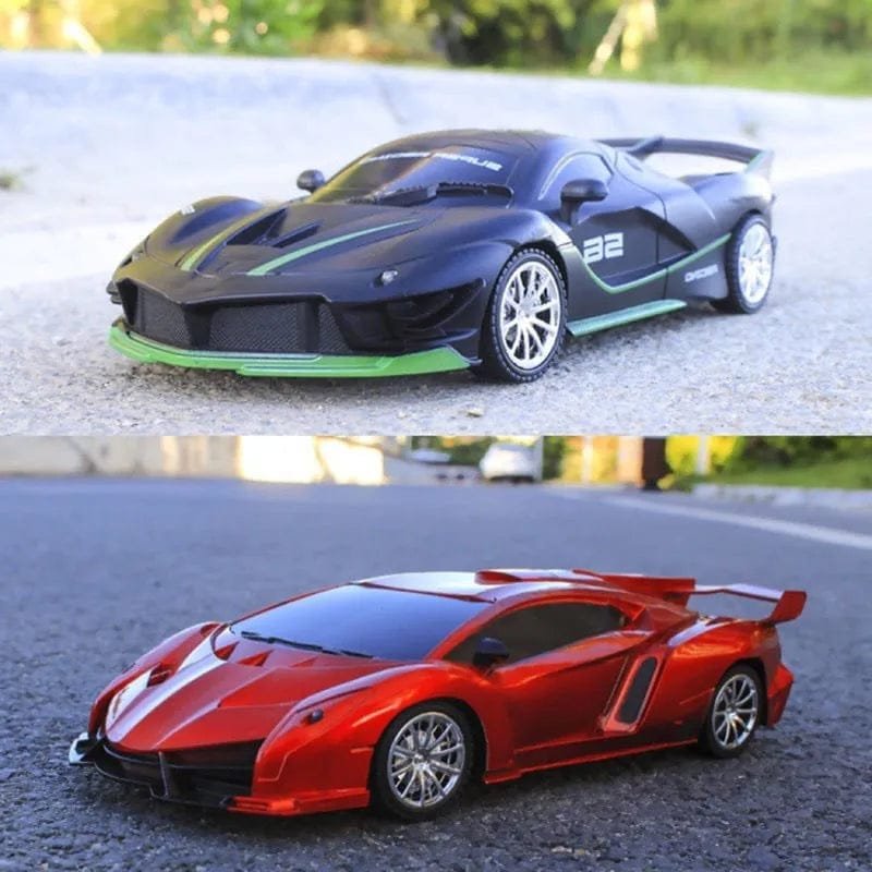 Black, green and red RC drift cars racing together for head-to-head remote control play.