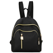 Black Kawaii Harajuku laptop backpack gold zipper close-up showing the hardware used for daily school carry.