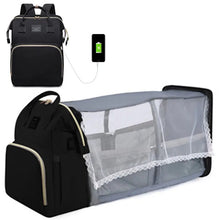 Foldable baby bed and large-capacity mommy bag in black with a mesh pocket and USB cable.