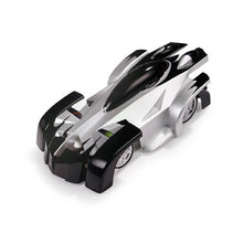 Black and silver ceiling climbing anti gravity remote stunt car for kids indoor play sessions.