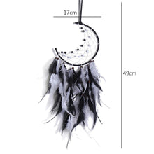 Black and white rattan dream catcher shown with a traditional size chart for wall decor.
