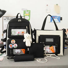 Black and white Kawaii cartoon print school bag set for teen girls carrying laptops, books, and daily essentials.