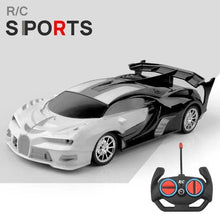 Black and white RC sports drift car with 2.4GHz remote for fast LED-lit racing sessions.