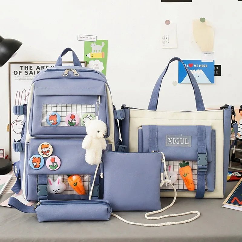Blue Kawaii Harajuku backpack set arranged on a study desk for organising homework, laptops, and stationery.