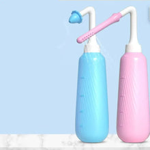 Blue and pink peri bottles for postpartum recovery cleansing, easy to keep by the bathroom or in a hospital bag.