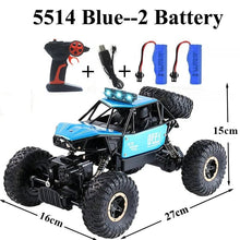 Blue rock crawler RC car with bubble toy, battery, and charger included for immediate outdoor remote control play.